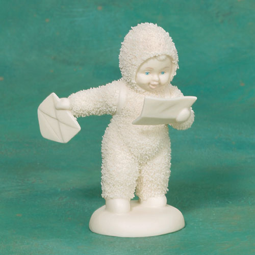 Cute image of Snow Baby feeding a seal with a bottle. Antique not a popular Dept 56 rep